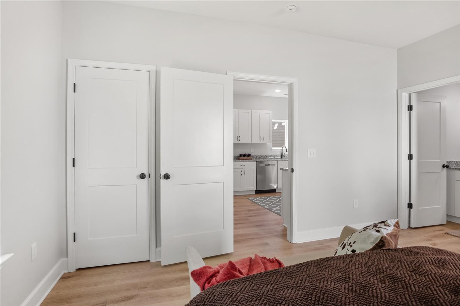 144 Eno Road Dickson, TN 37055 - Photo 13 of 15 a bedroom with a bed and a hallway