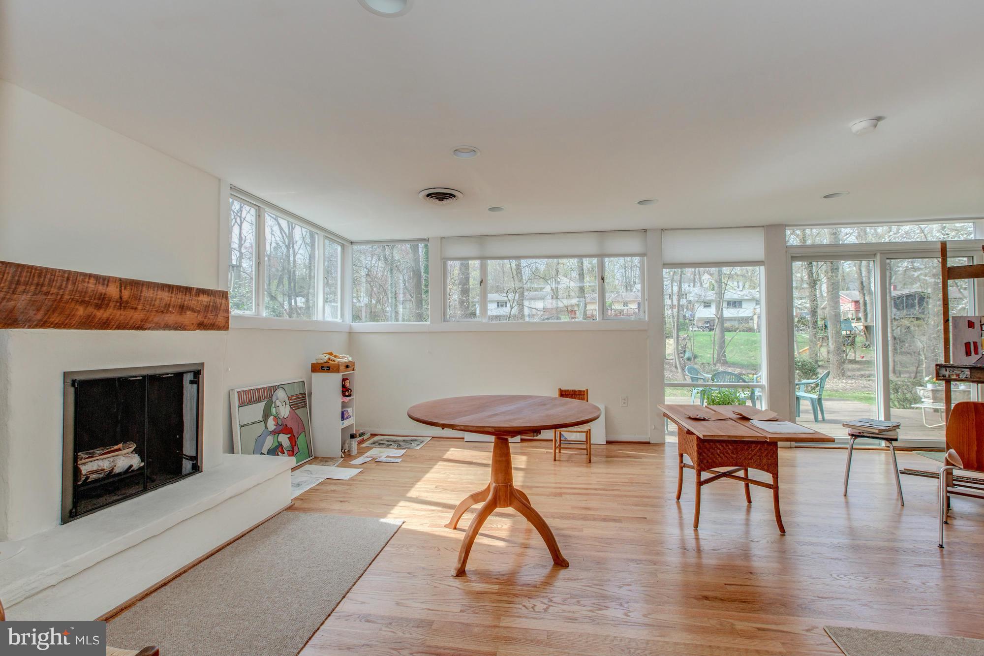 3916 Rickover Road Silver Spring, MD 20902 - Photo 15 of 23 a living room with furniture and a fireplace