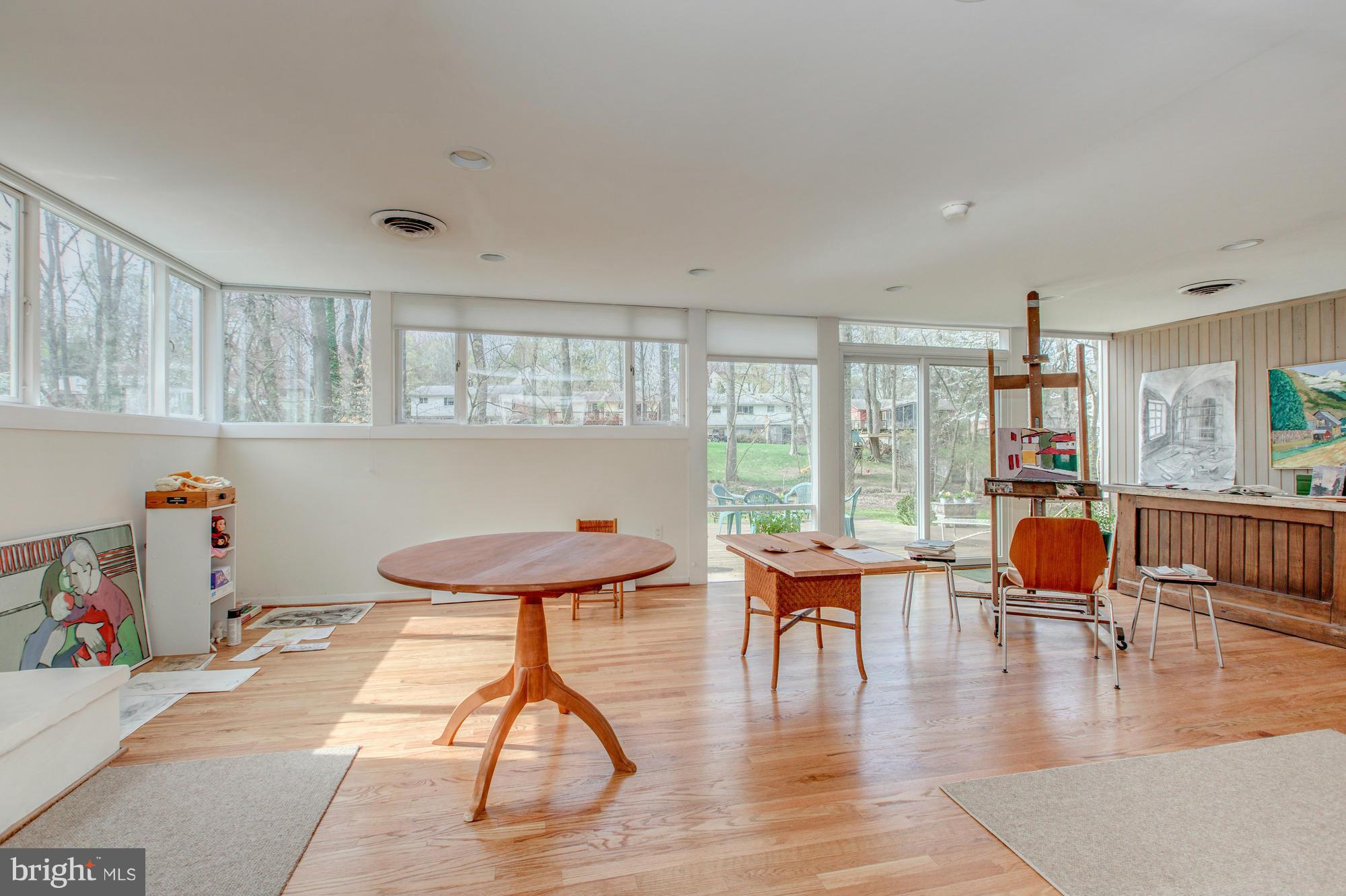 3916 Rickover Road Silver Spring, MD 20902 - Photo 16 of 23 a living room with furniture and a wooden floor