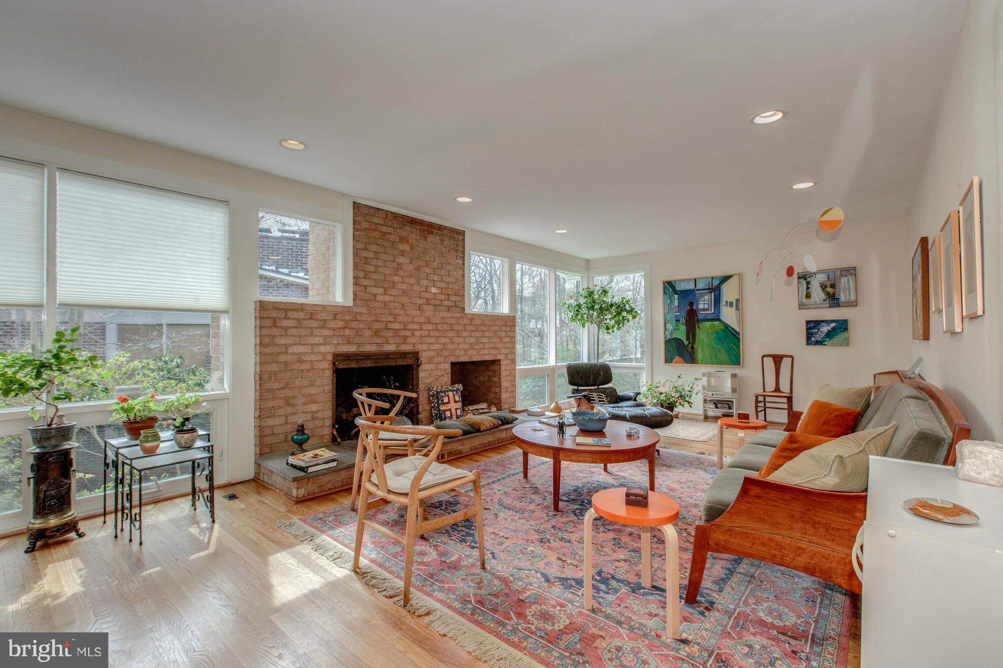 3916 Rickover Road Silver Spring, MD 20902 - Photo 3 of 23 a living room with fireplace furniture and a fireplace