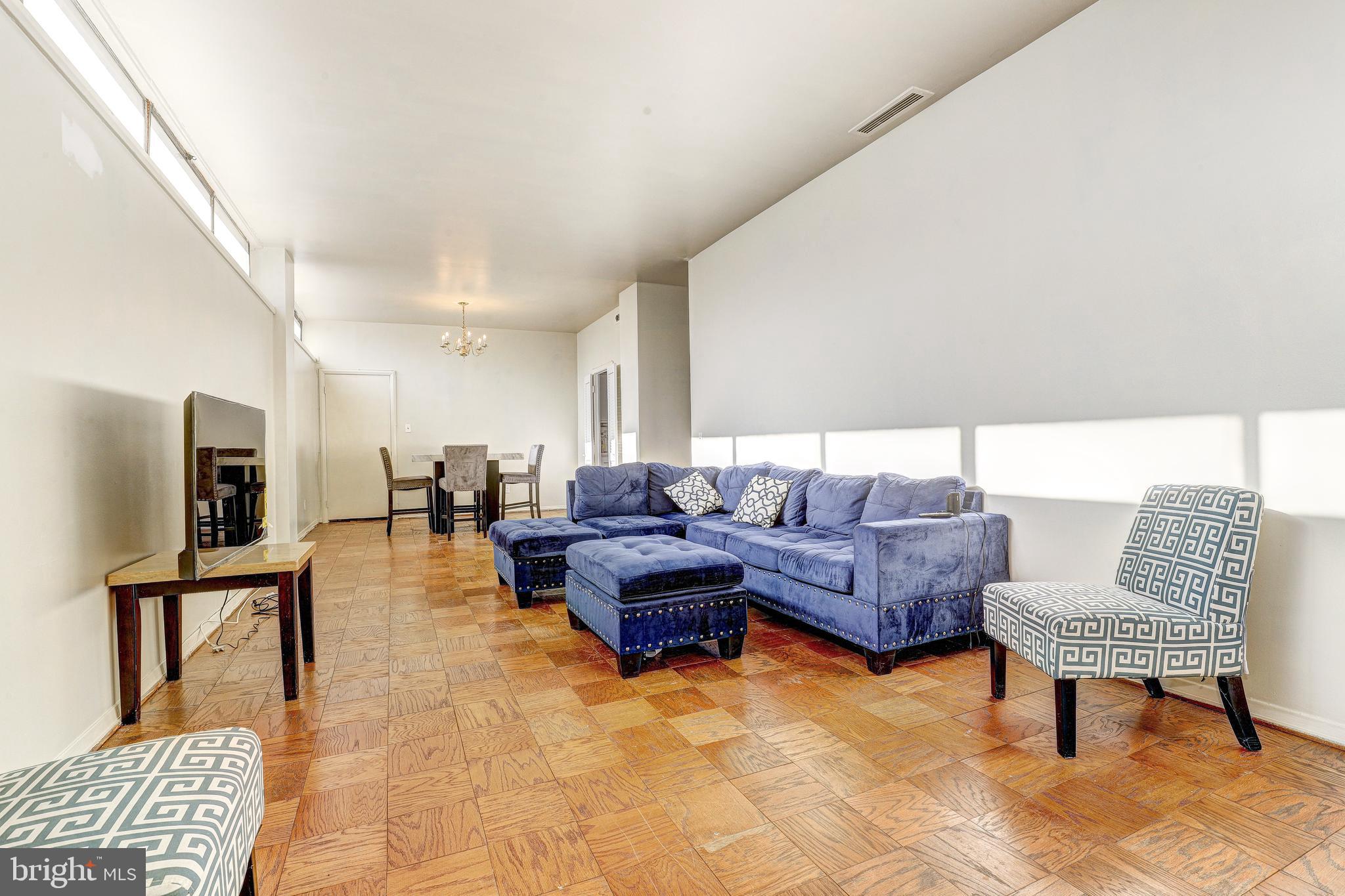 a living room with furniture and a couch