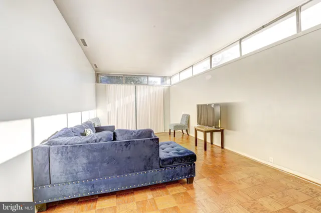 a bathroom with a sink a toilet and shower curtain