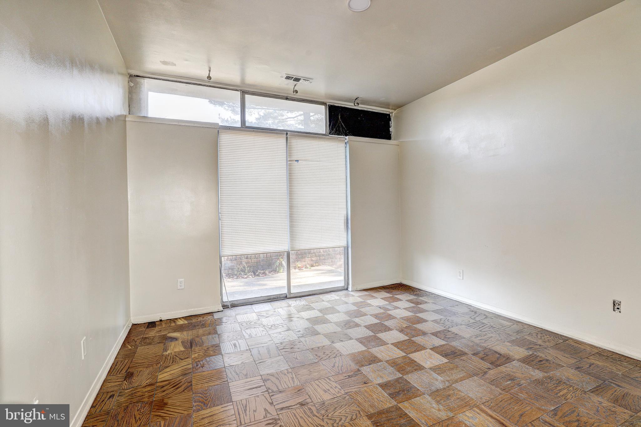 6606 Park Heights Avenue, Unit 111 Baltimore, MD 21215 - Photo 17 of 32 a view of an empty room