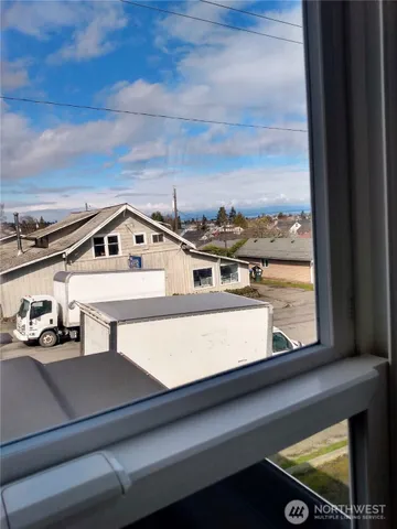 a view of a balcony with an outdoor space