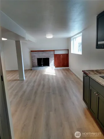 a spacious bathroom with a sink and a mirror