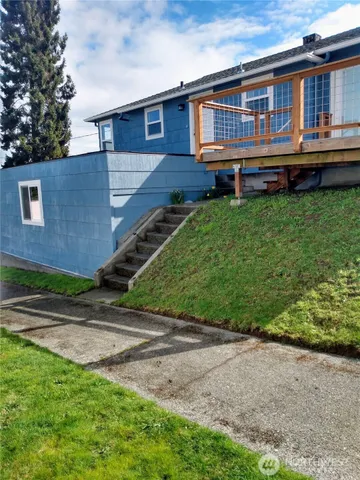 a house view with a garden space