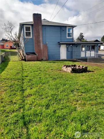 a view of a house with a swimming pool