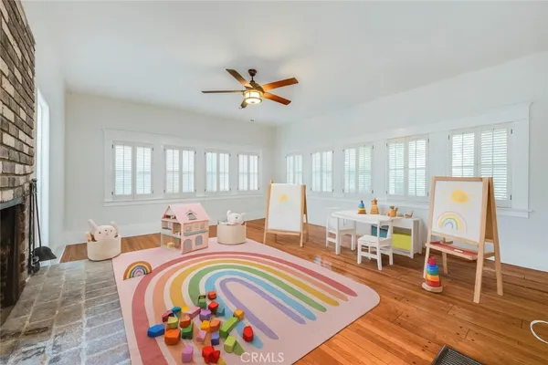 a bed room with furniture and a chair