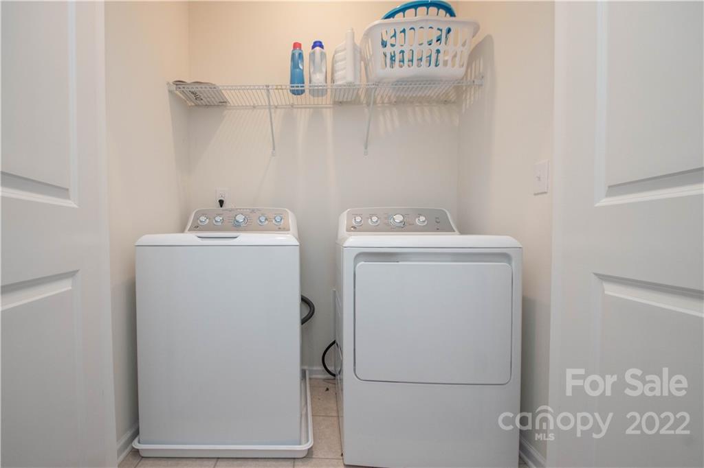 820 Ruckers Court Tega Cay, SC 29708 - Photo 25 of 46 a utility room with dryer and washer