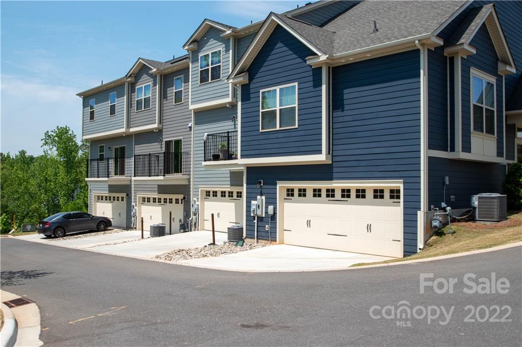 820 Ruckers Court Tega Cay, SC 29708 - Photo 39 of 46 a view of a building with a street