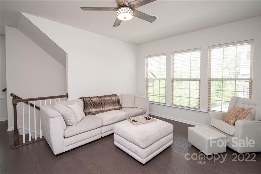 820 Ruckers Court Tega Cay, SC 29708 - Photo 7 of 46 a living room with furniture and a large window