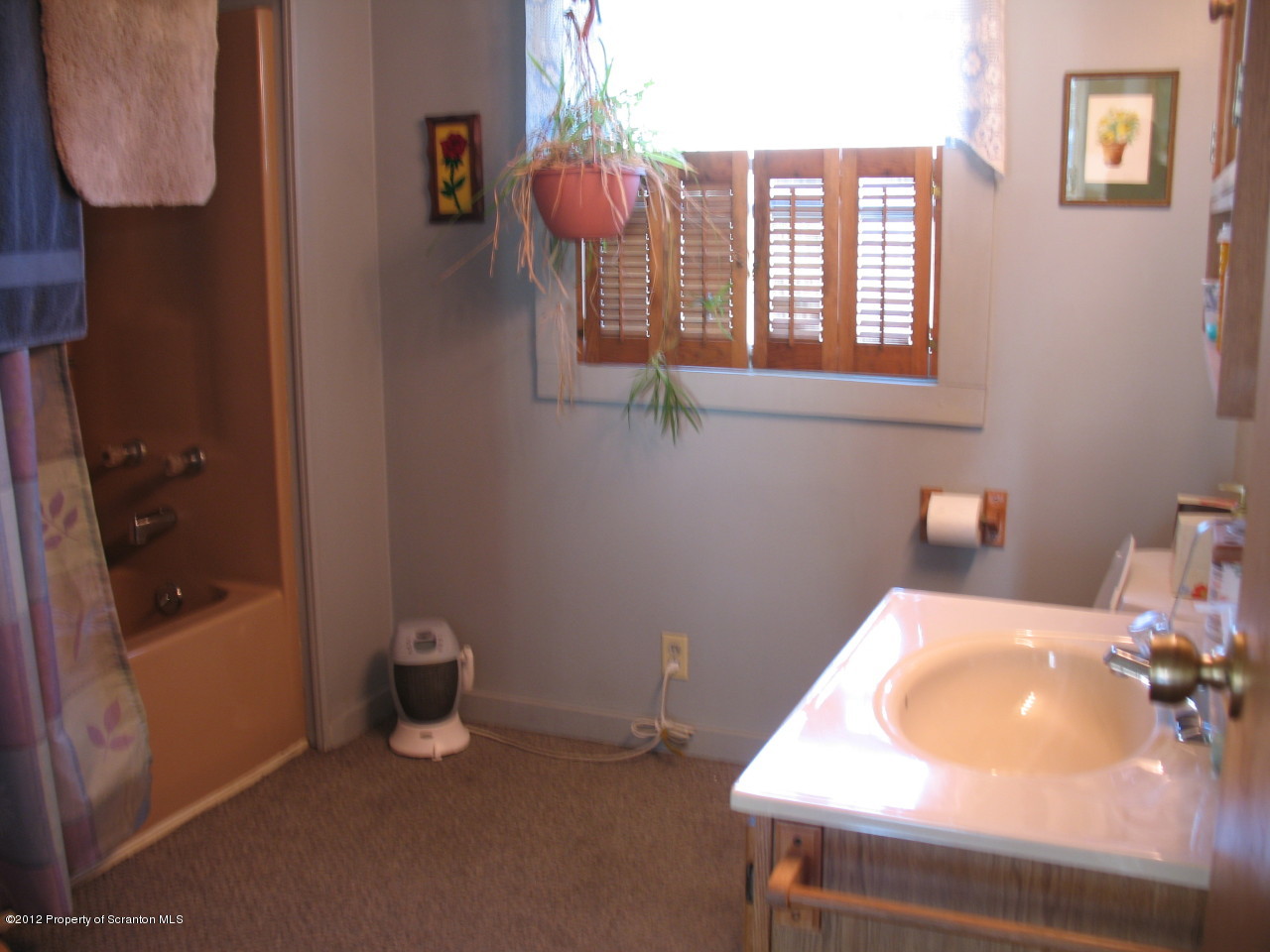 321 Cemetery Road Moscow, PA 18444 - Photo 13 of 17 a bathroom with a sink and a vanity