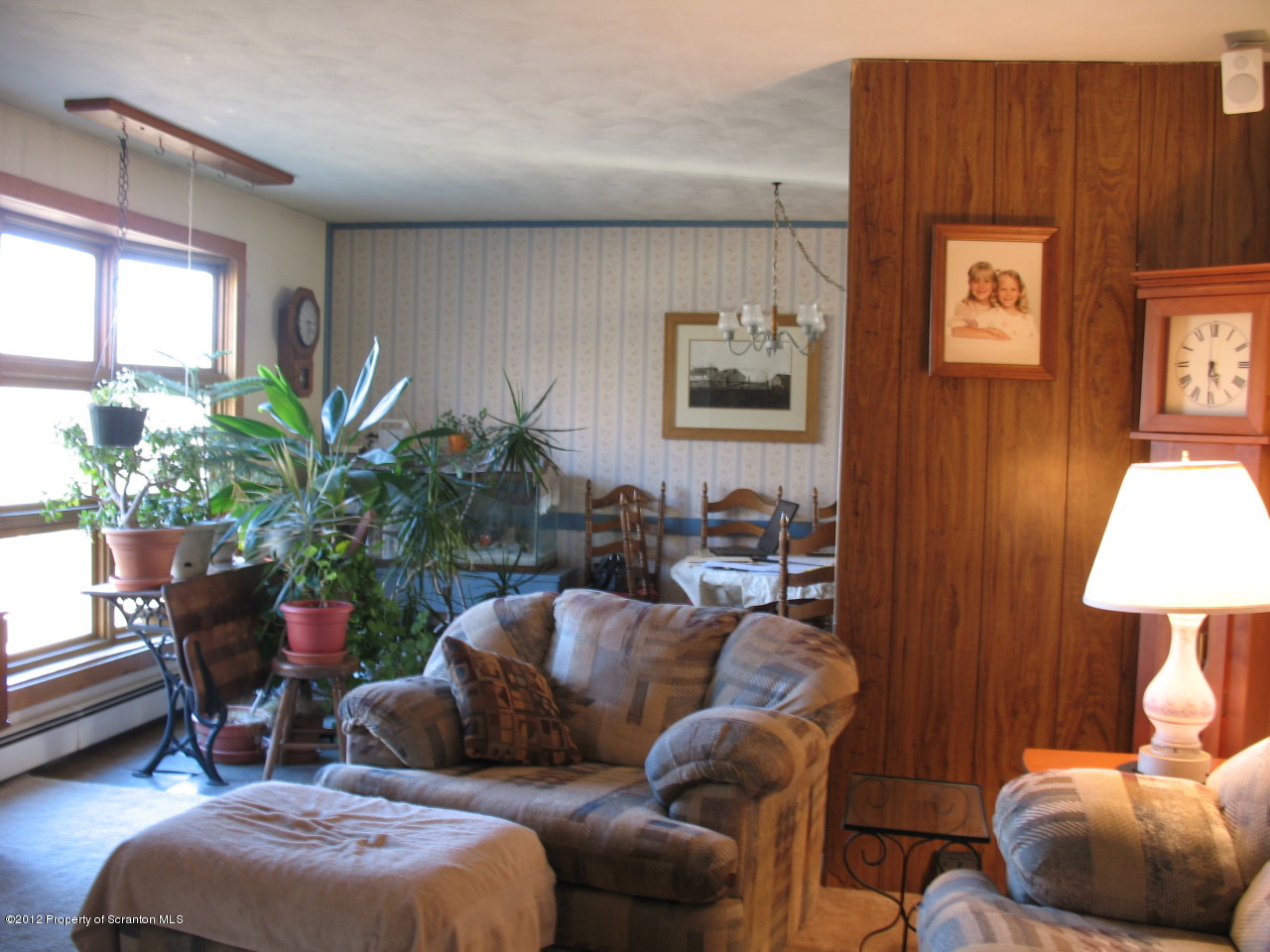 321 Cemetery Road Moscow, PA 18444 - Photo 5 of 17 a living room with furniture flowerpot and window