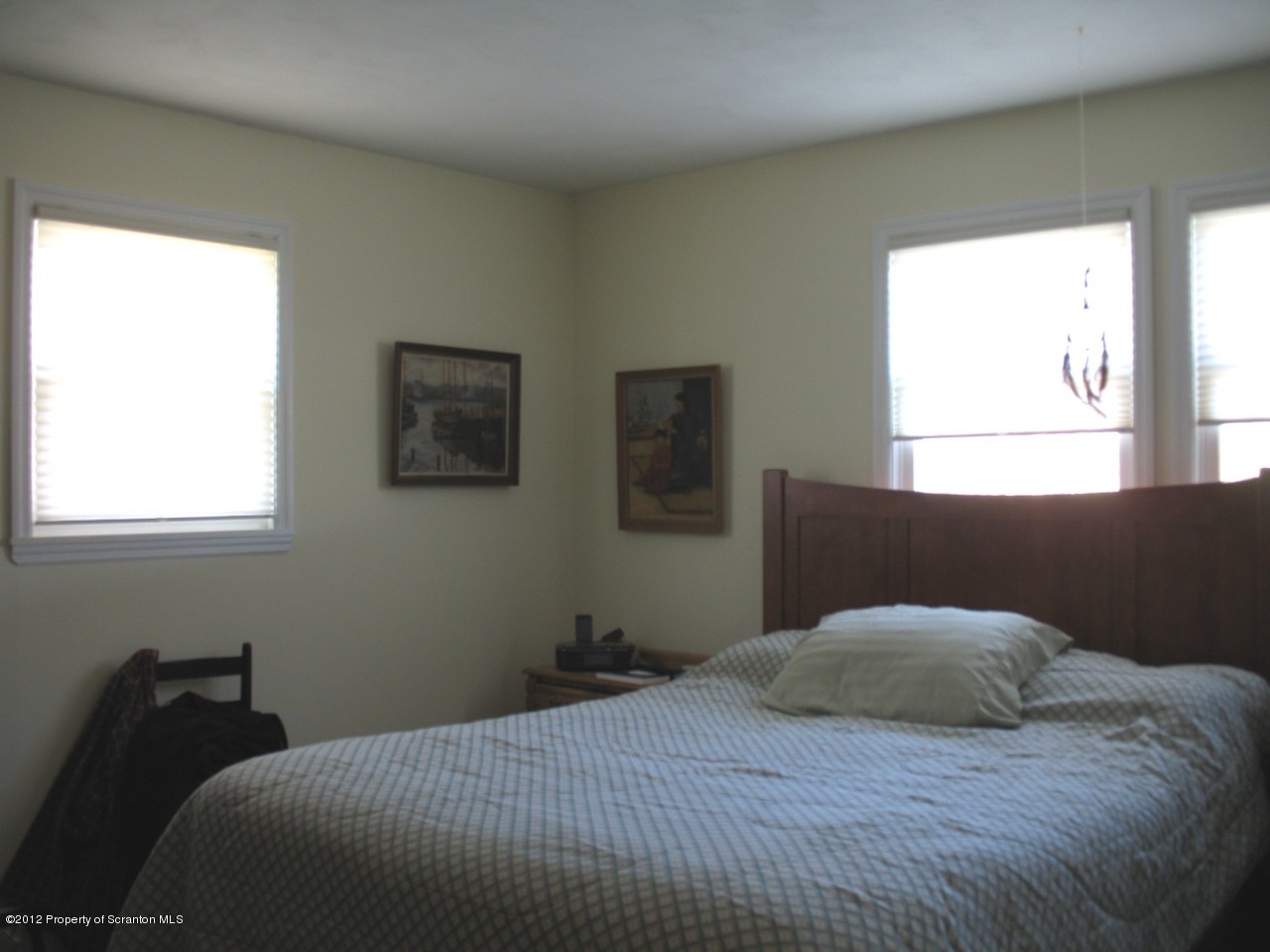 321 Cemetery Road Moscow, PA 18444 - Photo 10 of 17 a bedroom with a bed and a window