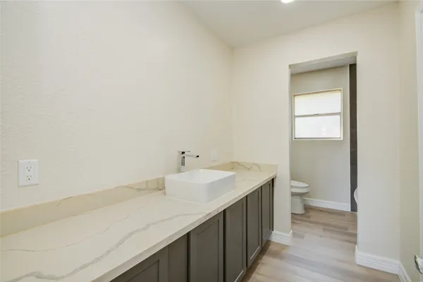 a bathroom with a sink and a toilet