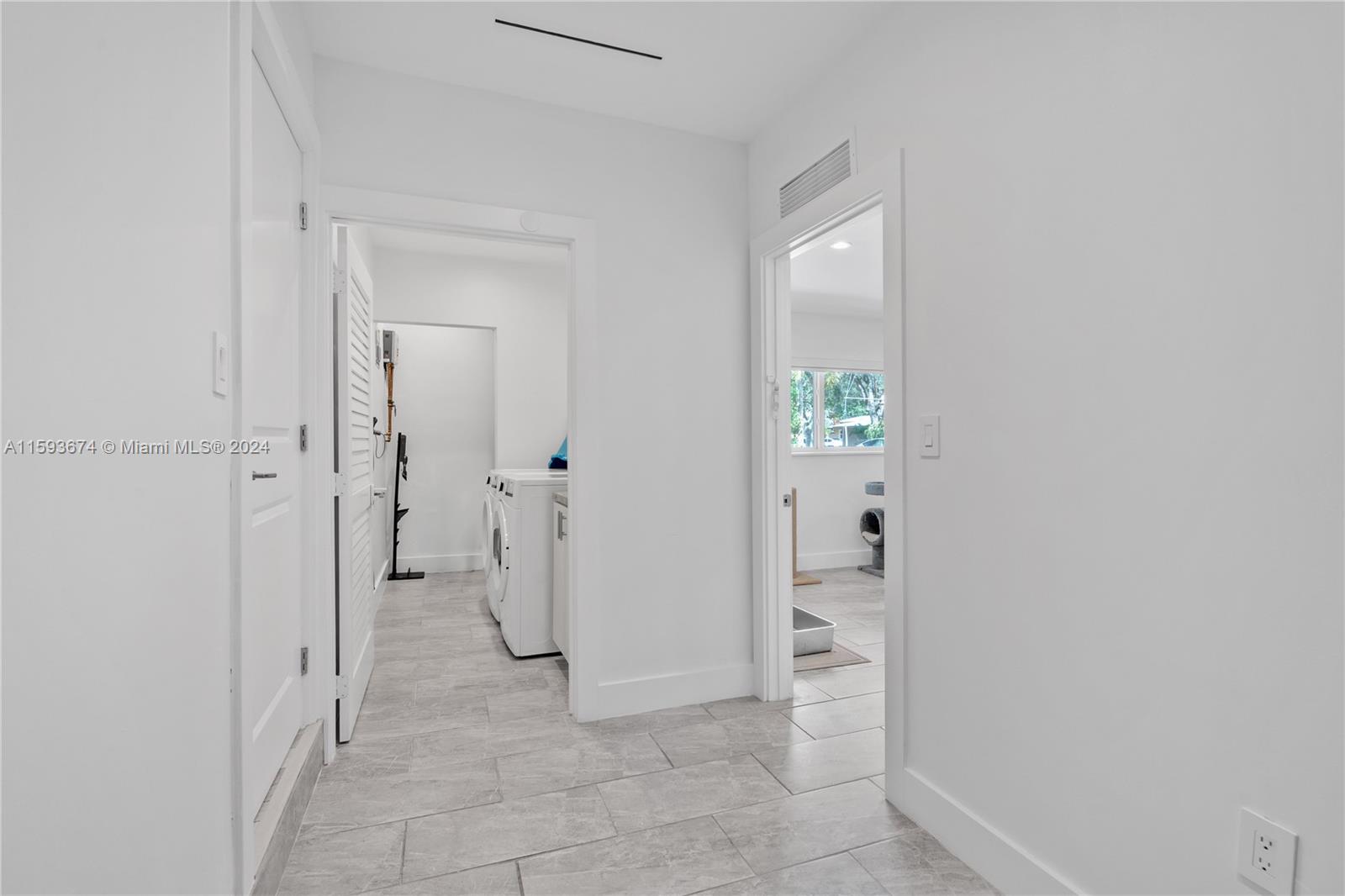 6341 Lake June Road Miami Lakes, FL 33014 - Photo 26 of 55 wooden floor in a gallery with a bathroom
