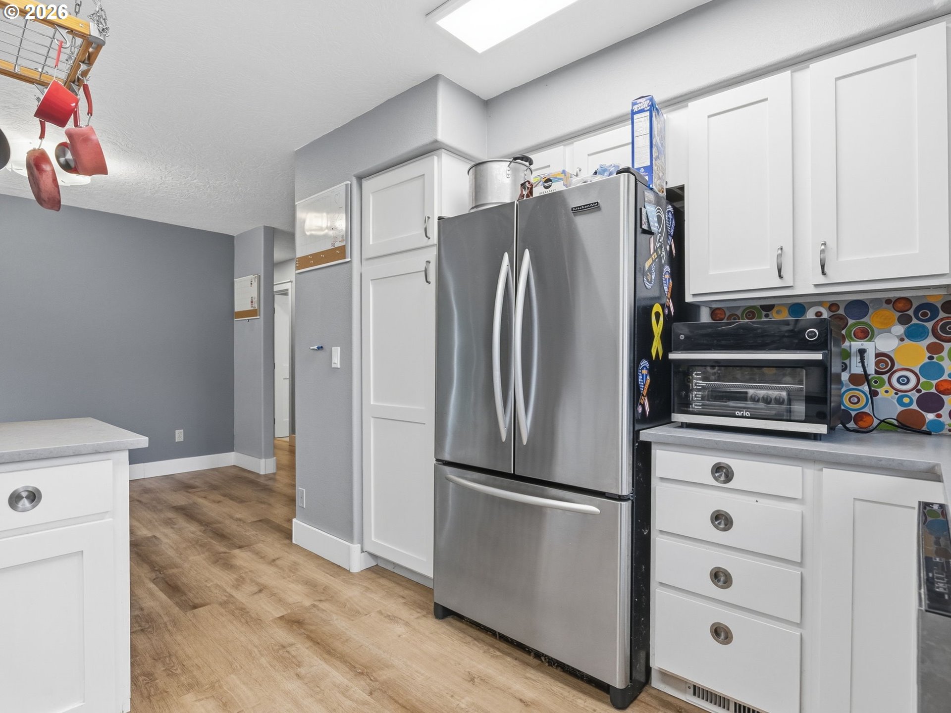 92085 Akerstedt Road Astoria, OR 97103 - Photo 13 of 48 a kitchen with stainless steel appliances a refrigerator sink and cabinets