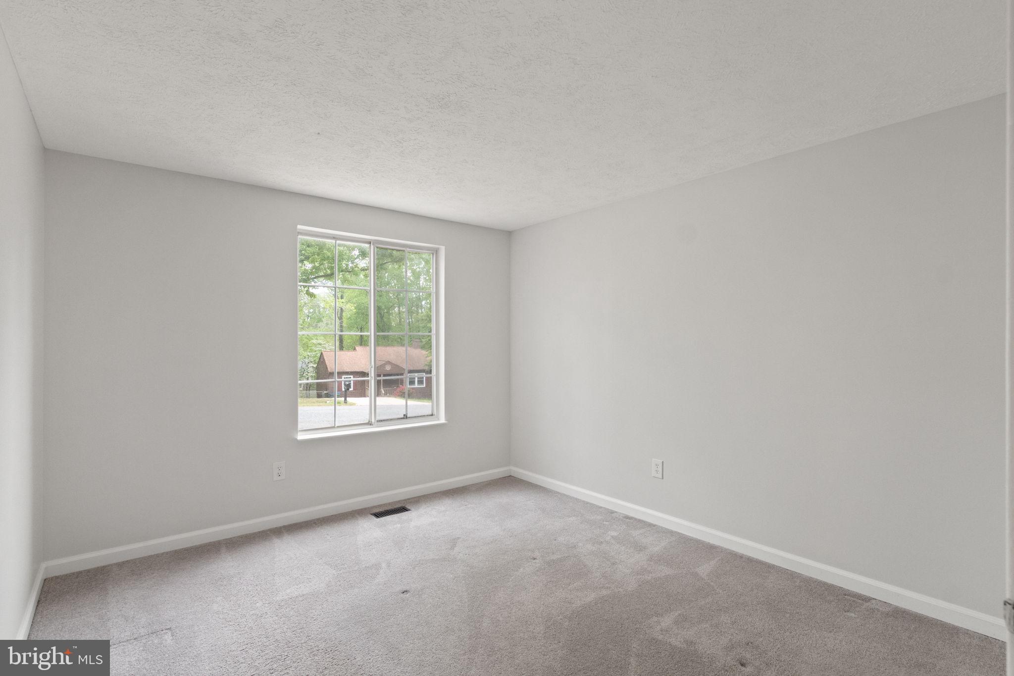 3 Cherry Laurel Drive Fredericksburg, VA 22405 - Photo 11 of 42 an empty room with a window