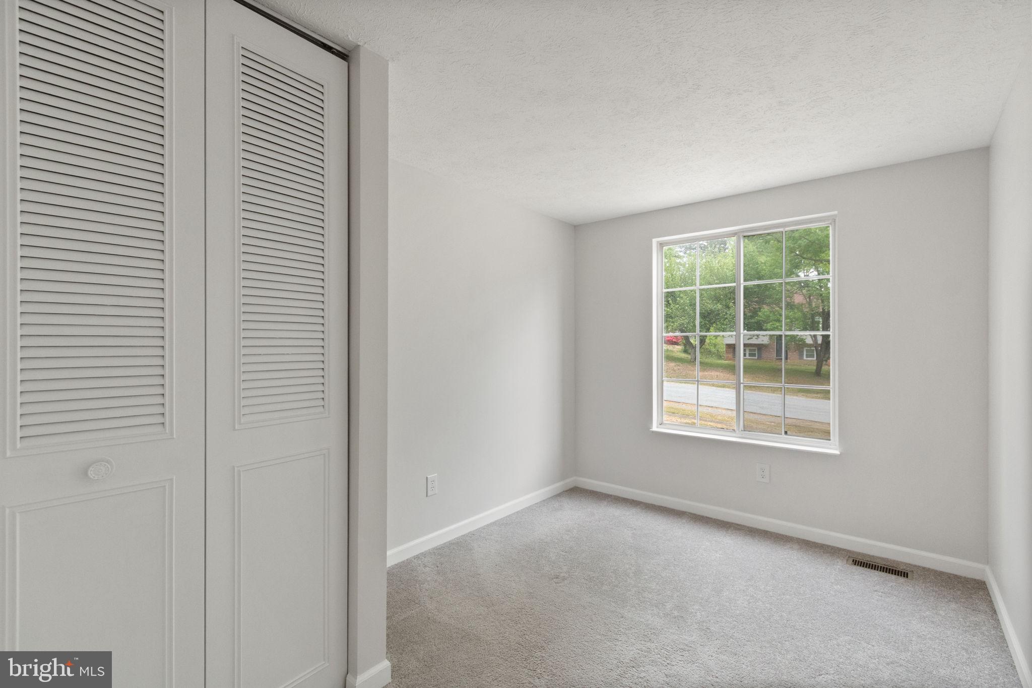 3 Cherry Laurel Drive Fredericksburg, VA 22405 - Photo 19 of 42 an empty room with a window