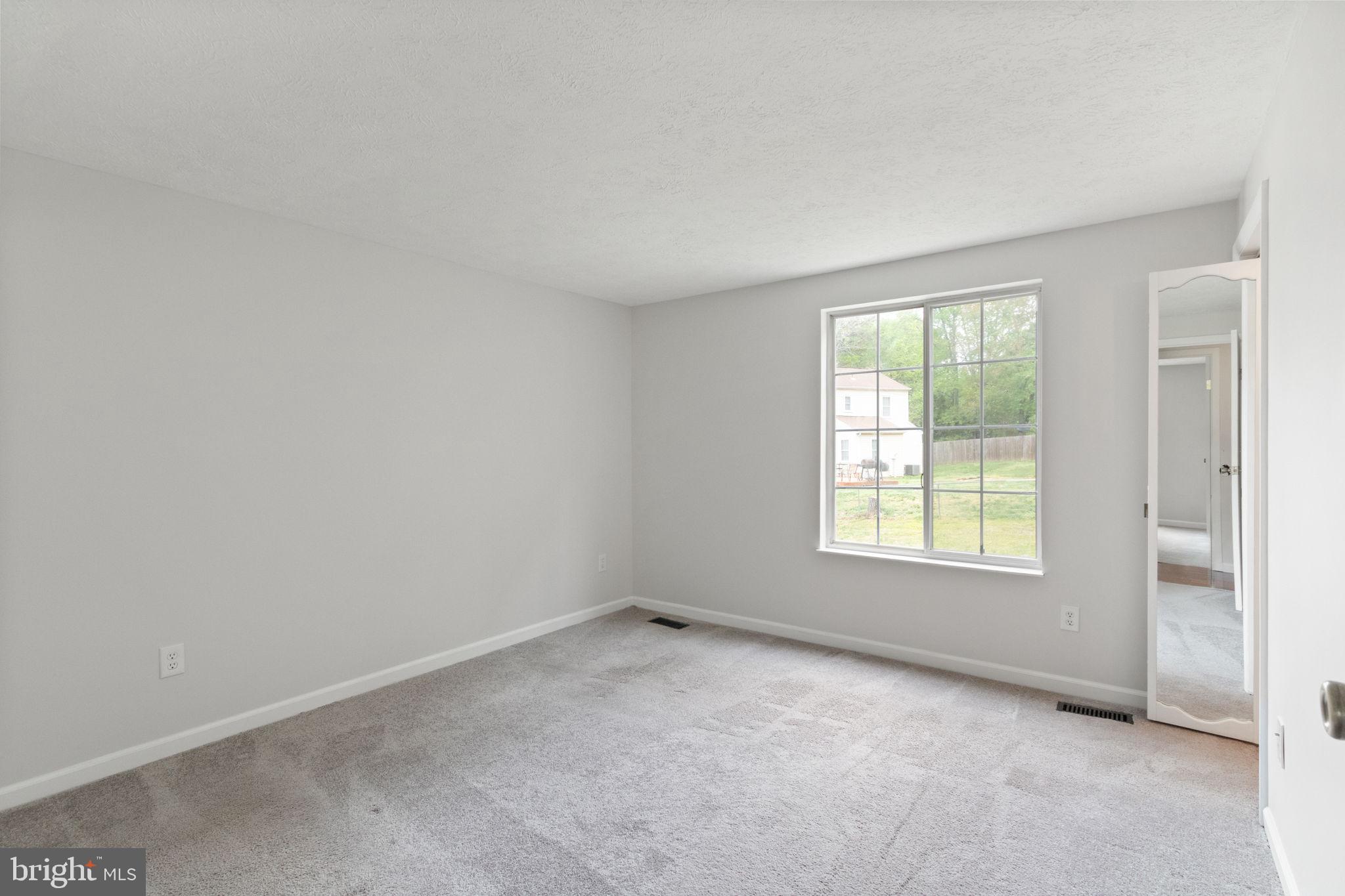 3 Cherry Laurel Drive Fredericksburg, VA 22405 - Photo 25 of 42 an empty room with a window