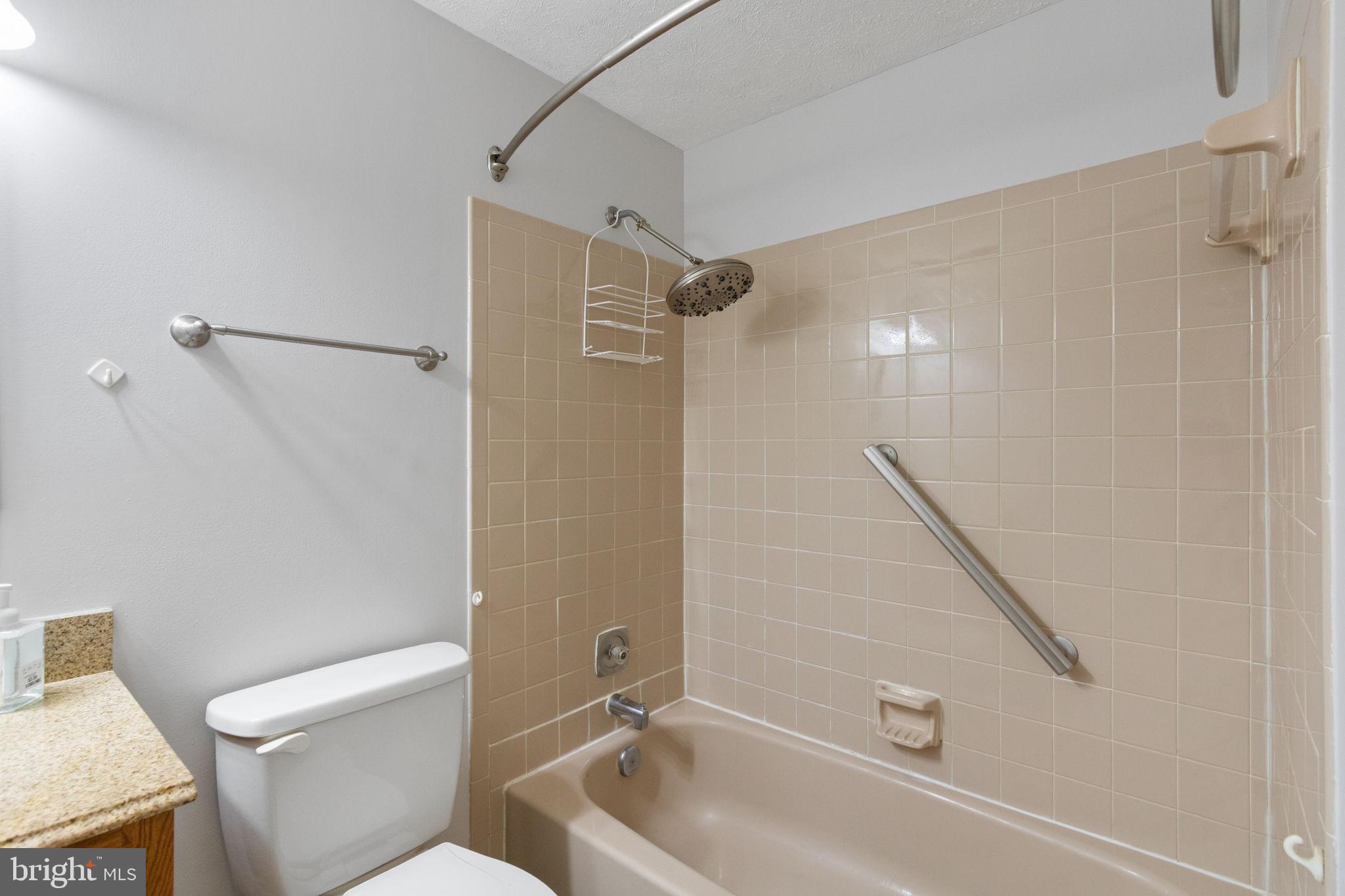 3 Cherry Laurel Drive Fredericksburg, VA 22405 - Photo 27 of 42 a bathroom with a bathtub and a toilet