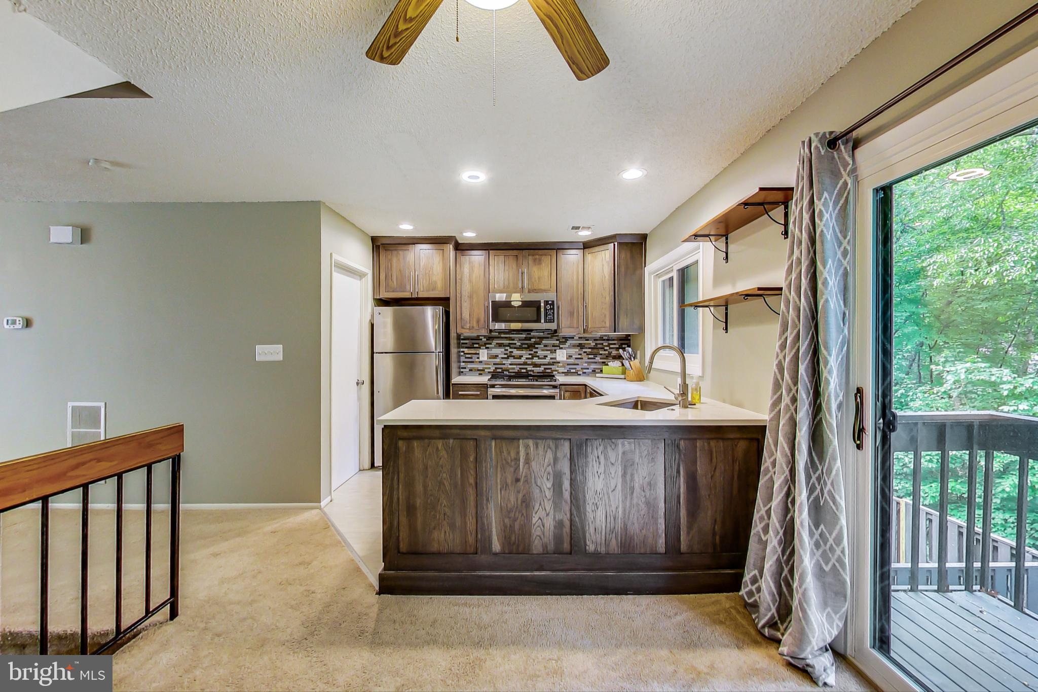 2184 Cartwright Place Reston, VA 20191 - Photo 12 of 46 Dining Room open to kitchen