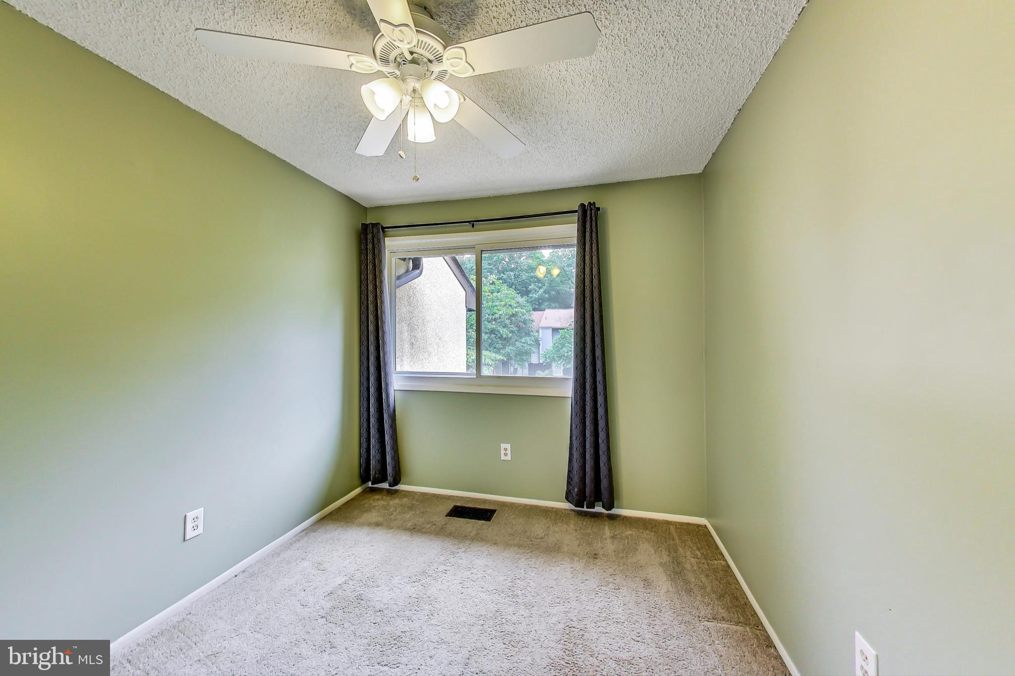 2184 Cartwright Place Reston, VA 20191 - Photo 27 of 46 Bedroom 2 has ceiling fan and large window