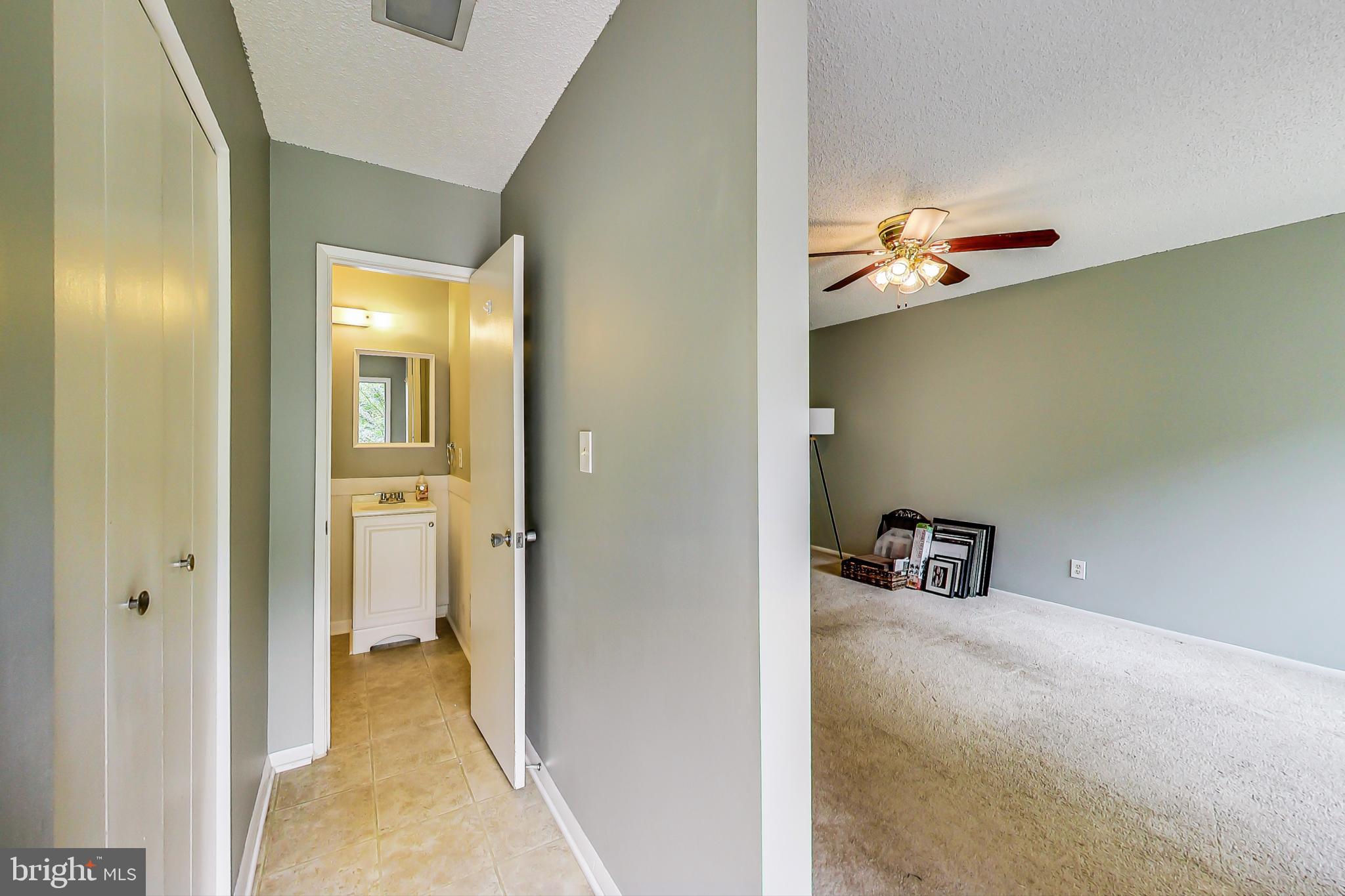 2184 Cartwright Place Reston, VA 20191 - Photo 4 of 46 Foyer and main level 1/2 bath