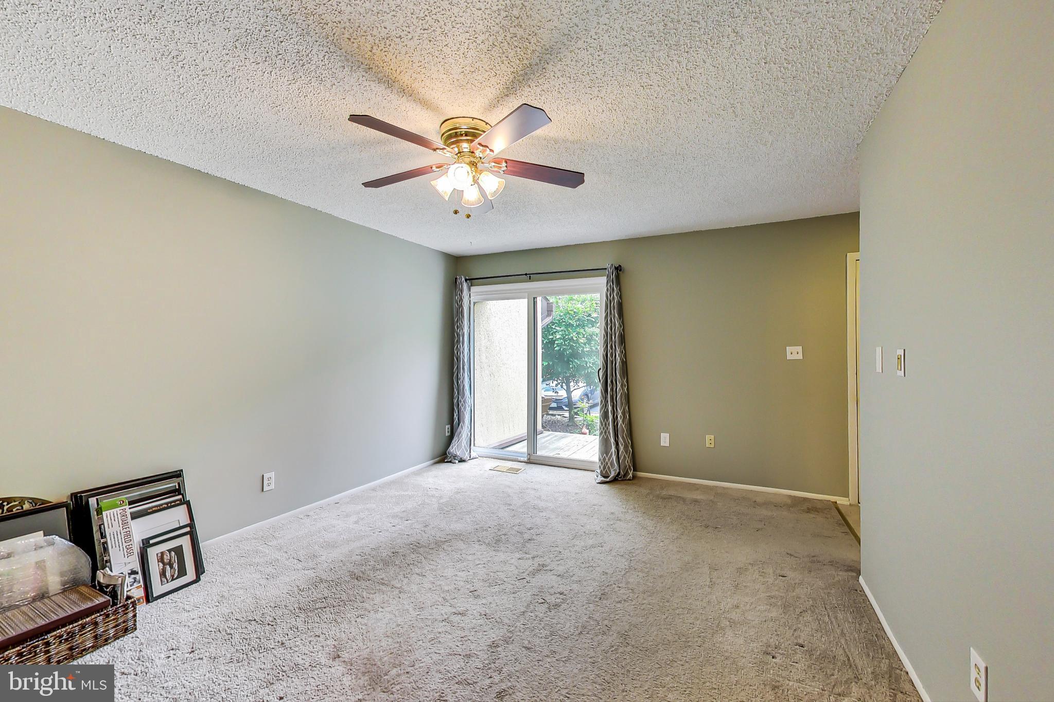 2184 Cartwright Place Reston, VA 20191 - Photo 7 of 46 Living Room with SGD to front deck
