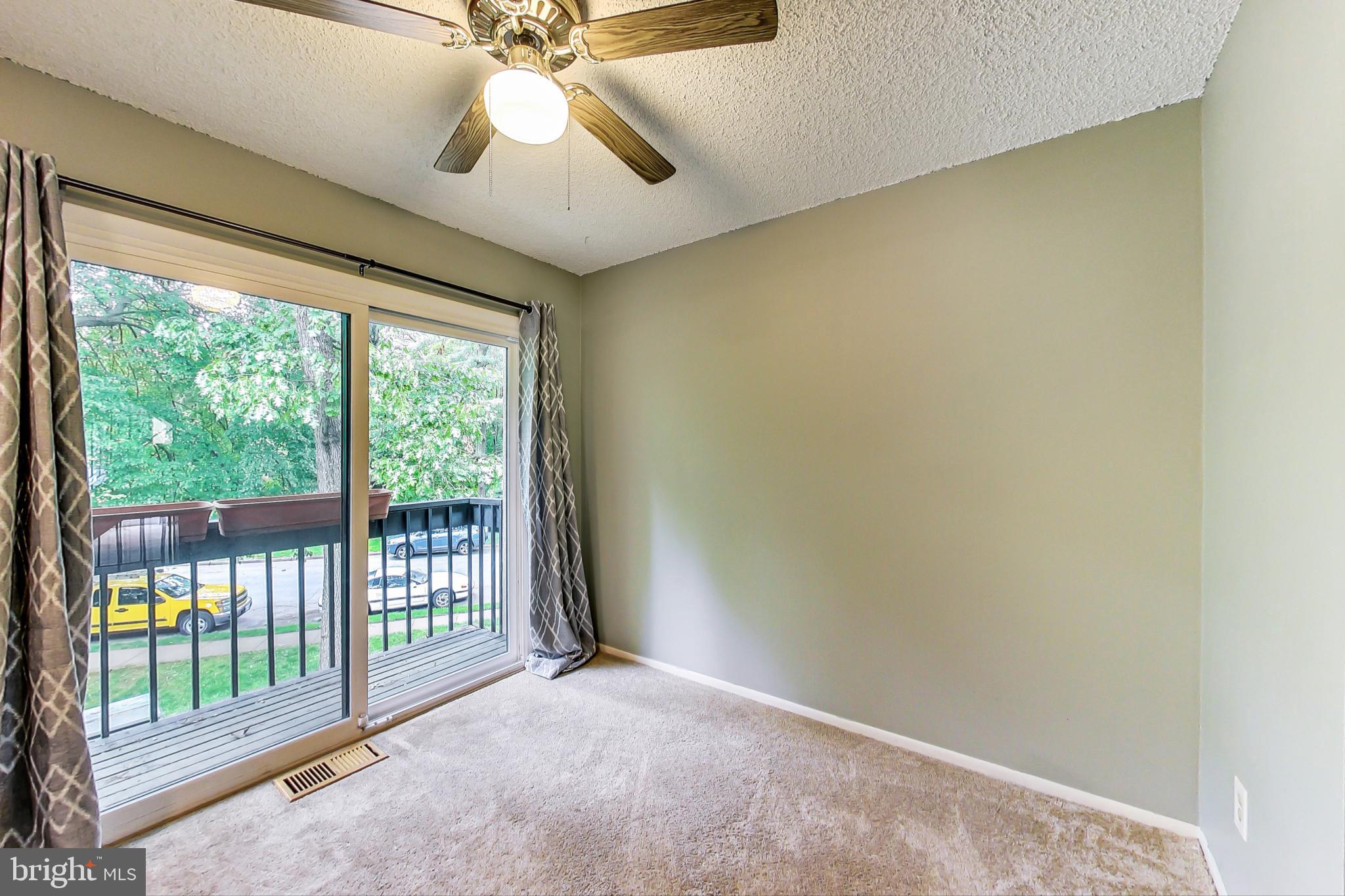 2184 Cartwright Place Reston, VA 20191 - Photo 10 of 46 Dining Room with balcony overlooking yard