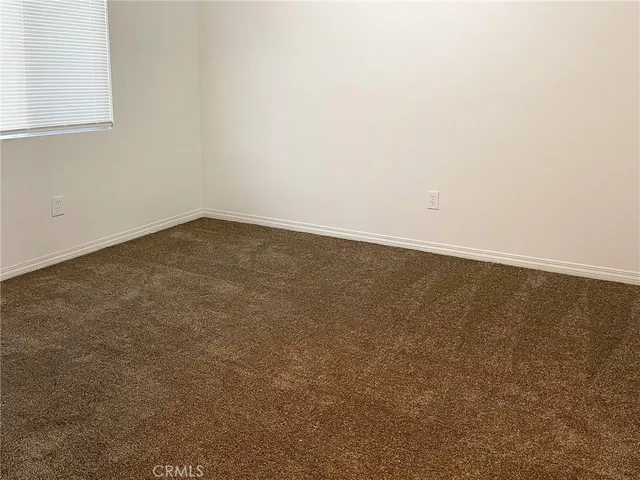 an empty room with a workbench