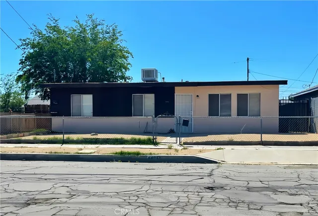 a view of swimming pool with a yard