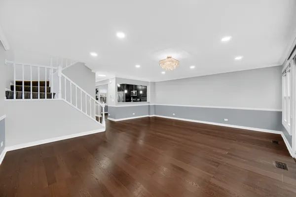 a view of a livingroom with wooden floor