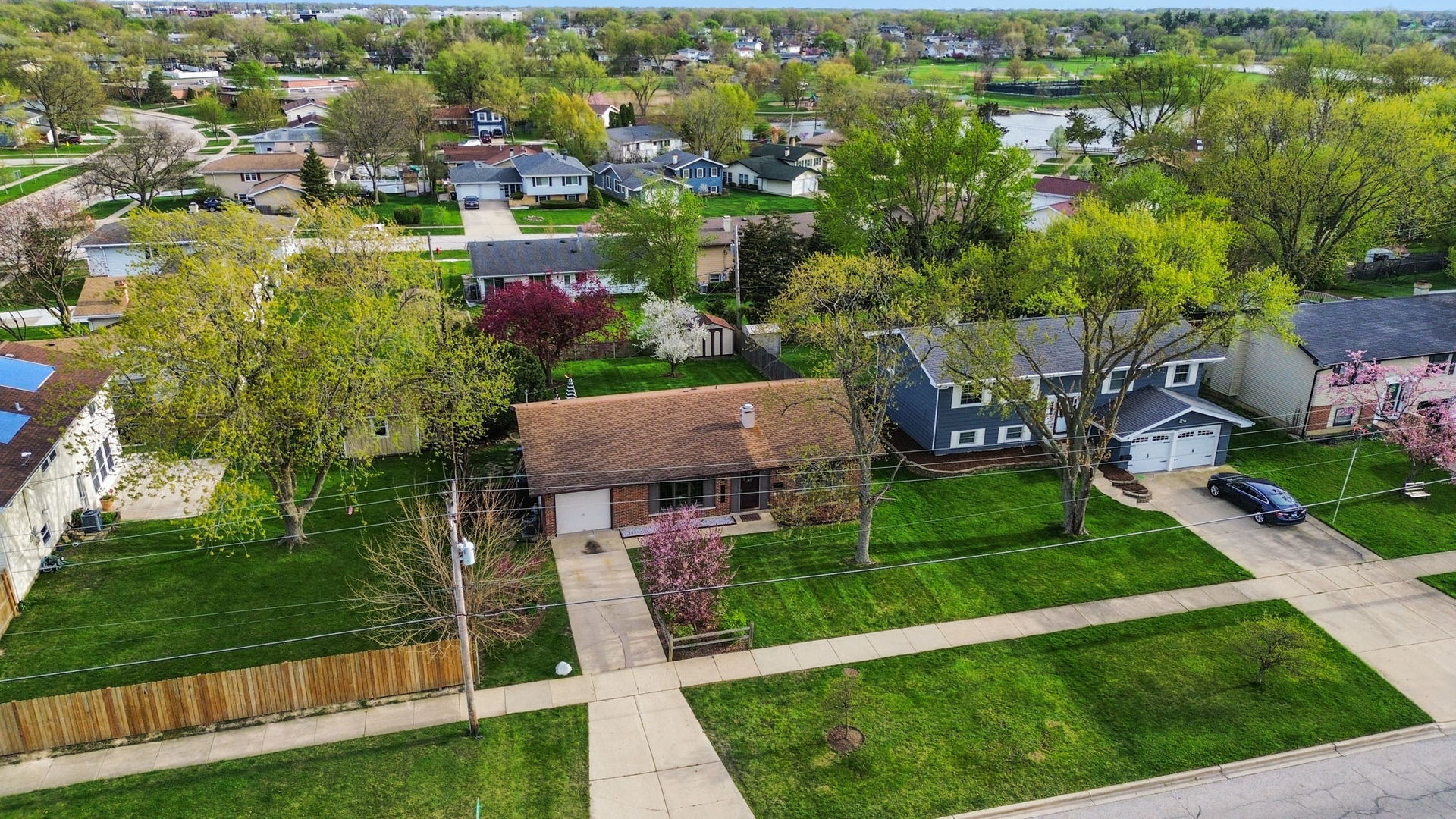 1155 Hassell Road Hoffman Estates, IL 60169 - Photo 3 of 34 an aerial view of residential houses with outdoor space and trees