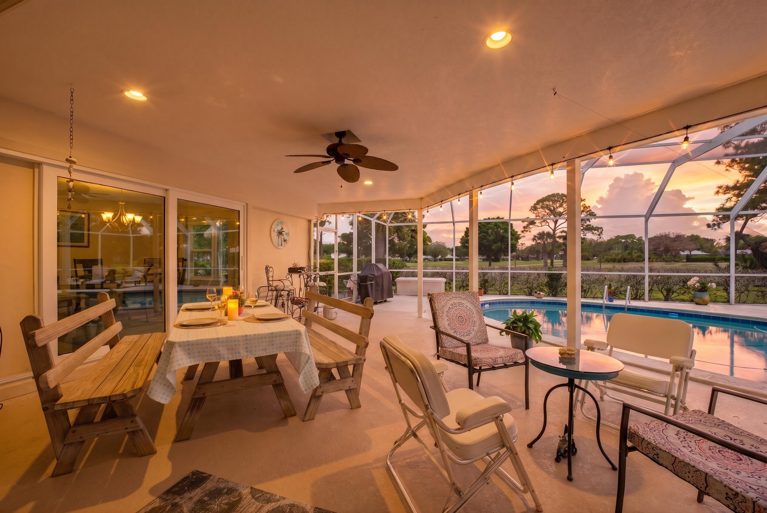 3491 Southeast Clubhouse Place Stuart, FL 34997 - Photo 39 of 43 a view of a living room and balcony