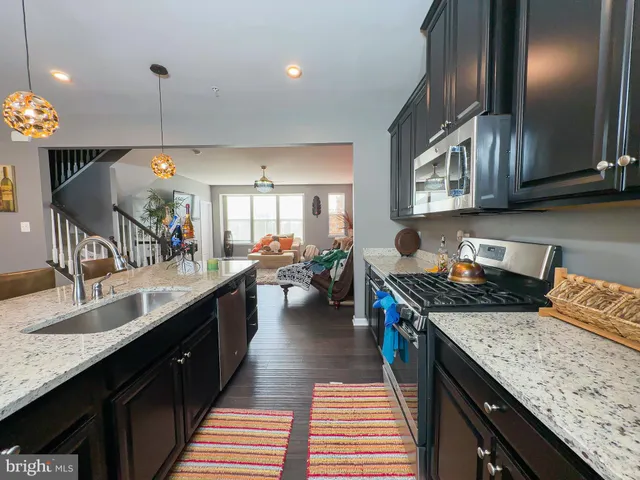 a kitchen with granite countertop lots of counter top space