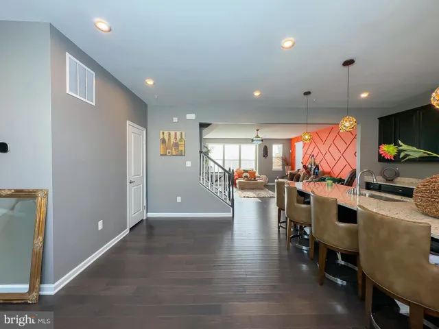 a view of a living room and dining room