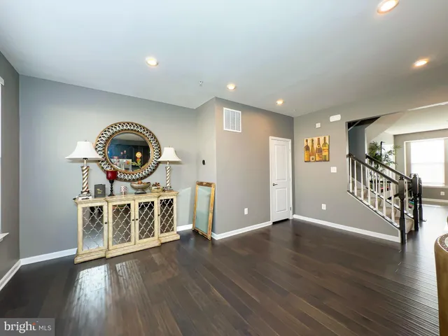a view of a livingroom with wooden floor