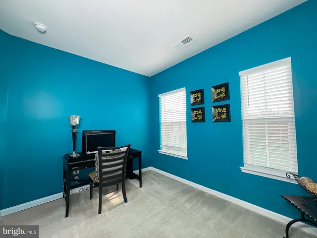 a room with furniture and a window