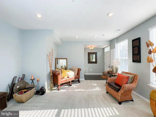 a bedroom with furniture and a couch