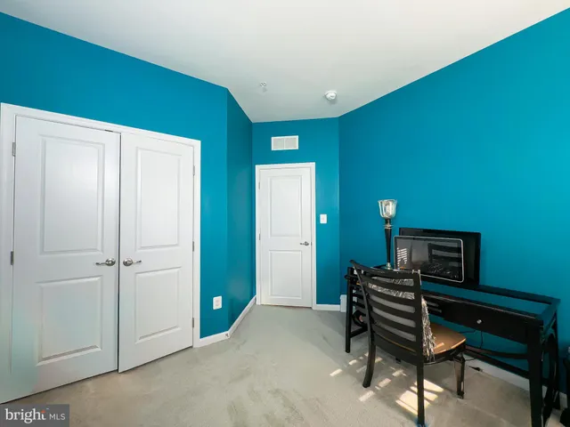 a room with furniture and a piano