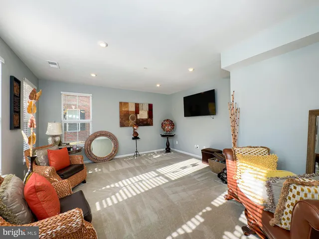 a bedroom with bed and flat screen tv