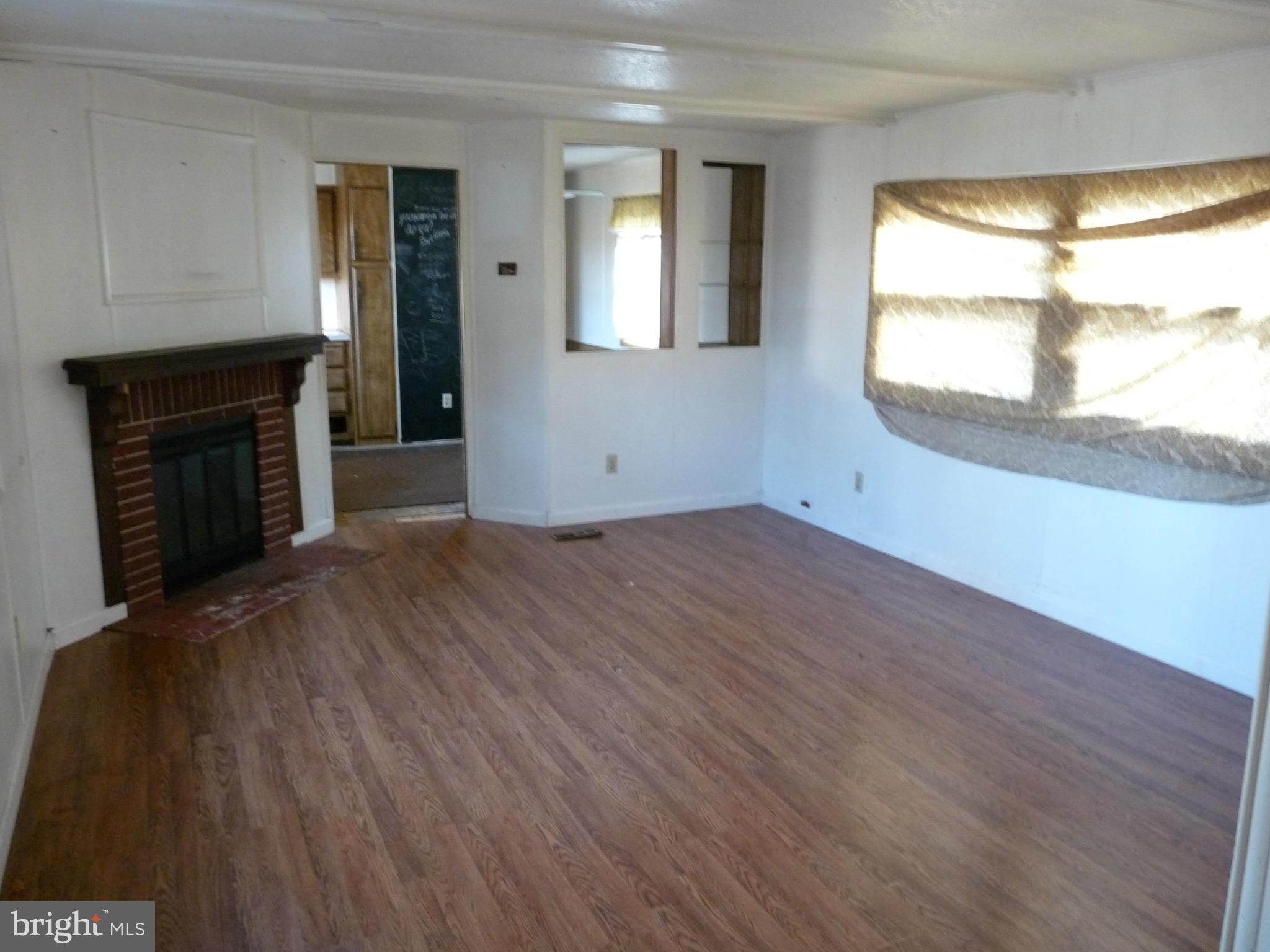 1202 Trappe Road Street, MD 21154 - Photo 5 of 12 Living Room with Fireplace