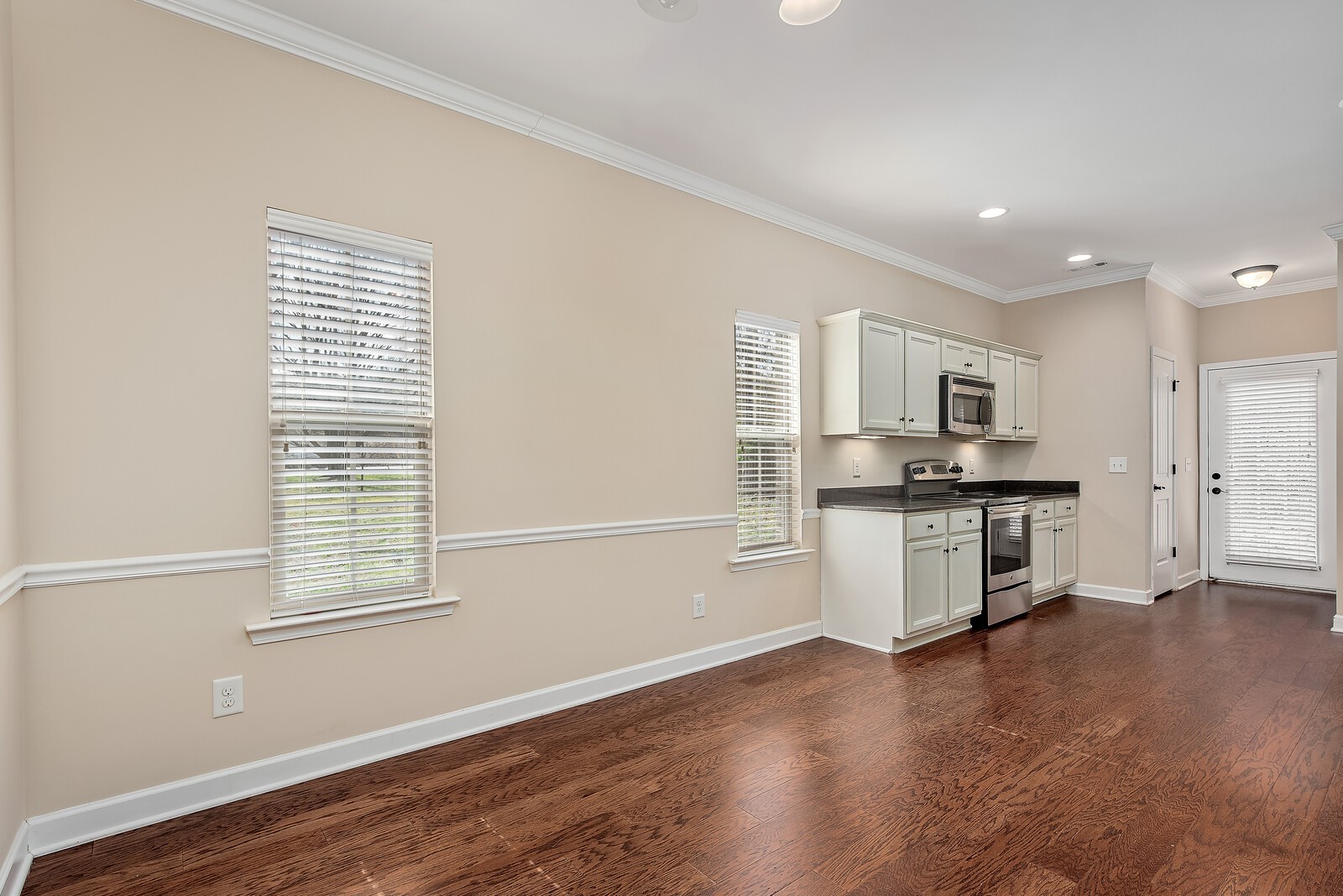 105 Velena Street Franklin, TN 37064 - Photo 9 of 31 a kitchen with stainless steel appliances a refrigerator sink and cabinets