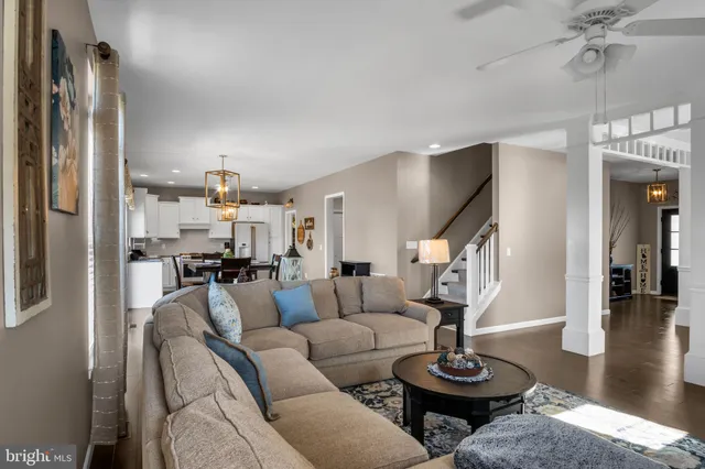 a bedroom with a bed and a night stand