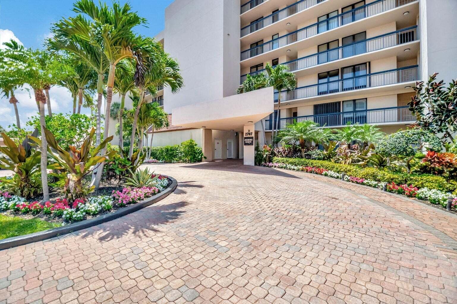 2707 North Ocean Boulevard, Unit D205 Boca Raton, FL 33431 - Photo 50 of 51 a front view of a multi story residential apartment building