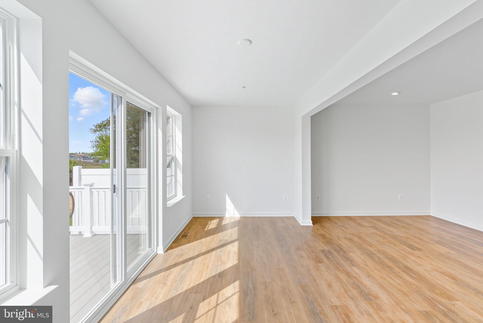 151 Homestead Drive Hanover, PA 17331 - Photo 11 of 46 a view of a room with wooden floor and windows