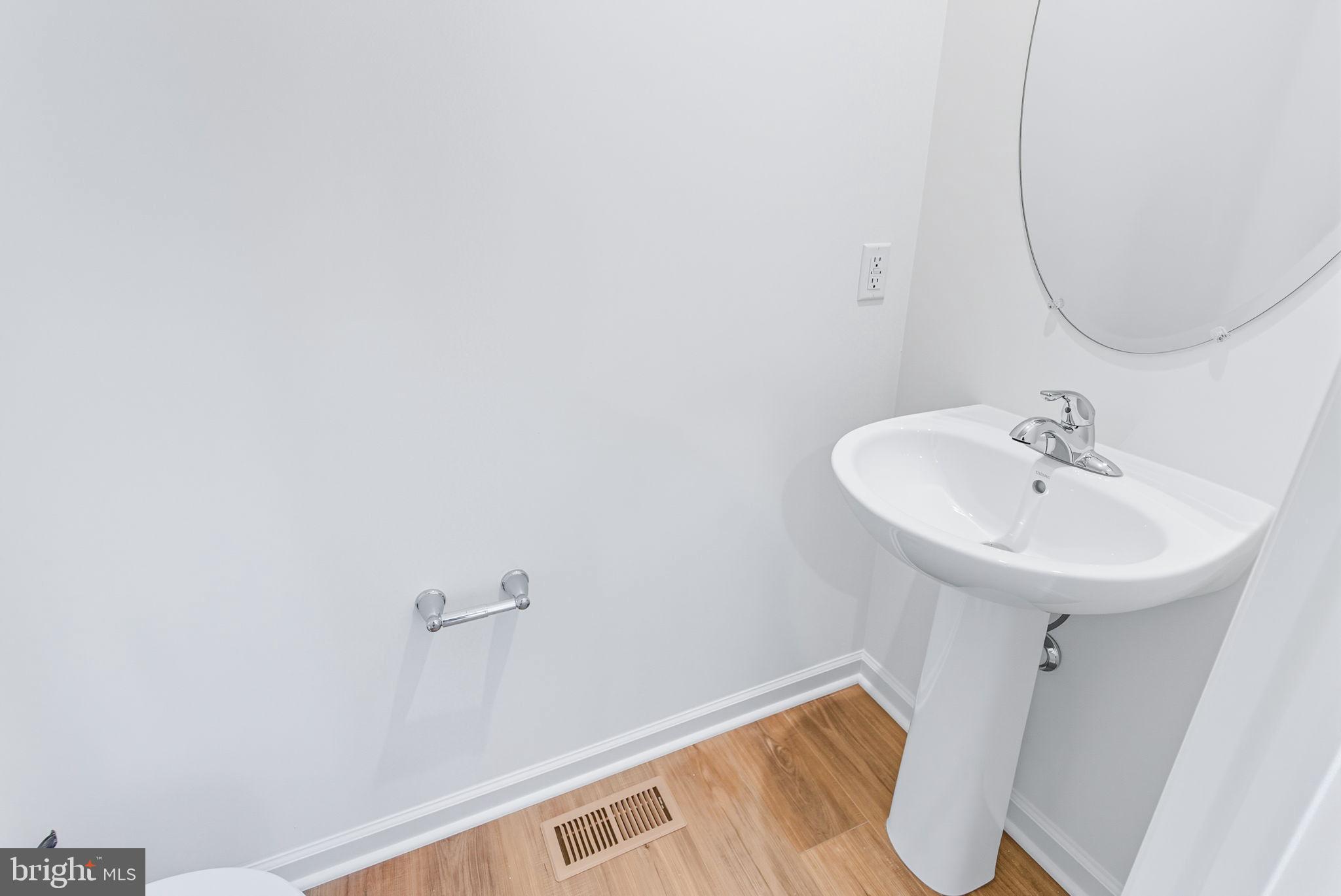 151 Homestead Drive Hanover, PA 17331 - Photo 14 of 46 a bathroom with a sink and a mirror