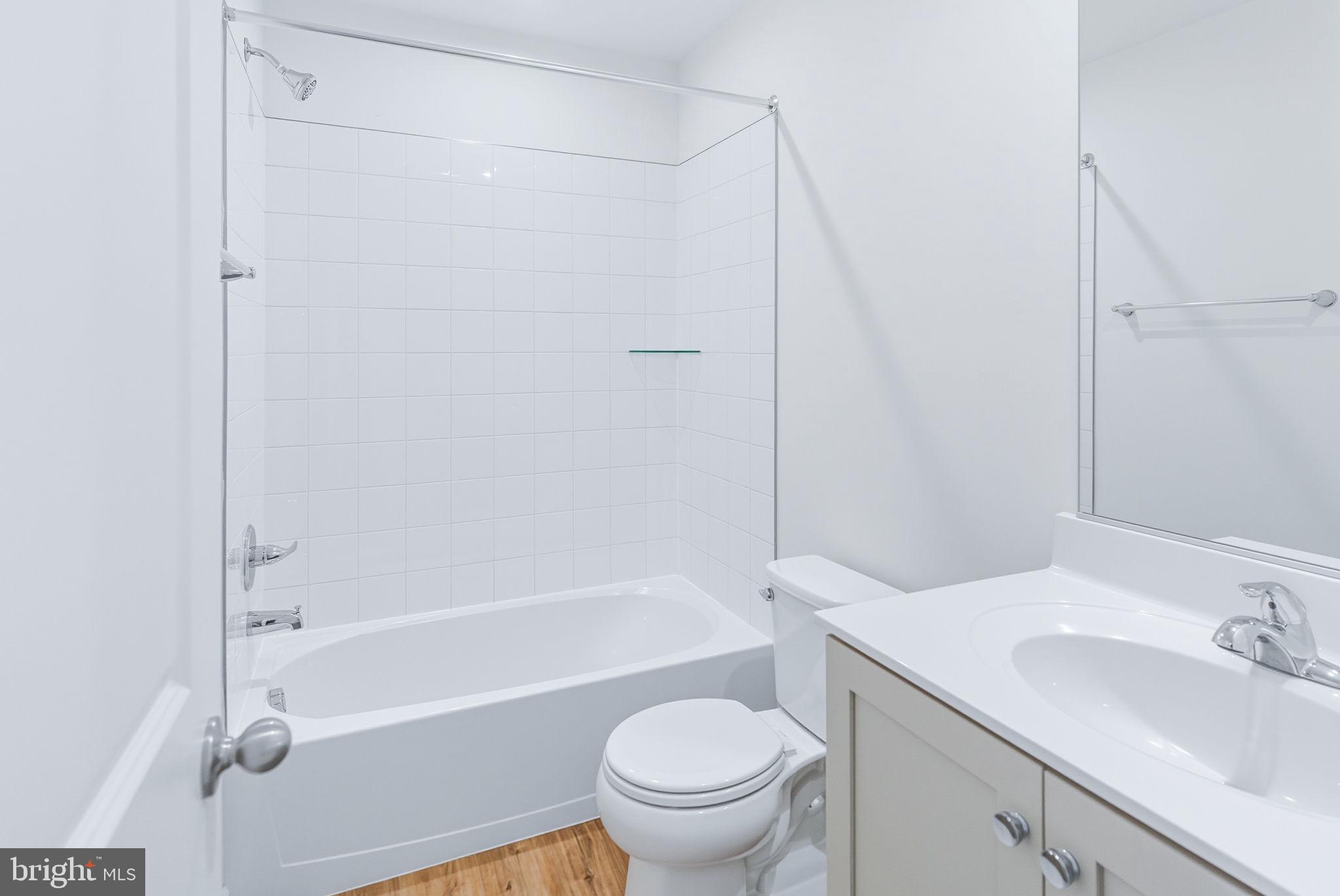 151 Homestead Drive Hanover, PA 17331 - Photo 27 of 46 a bathroom with a sink a toilet and a bathtub