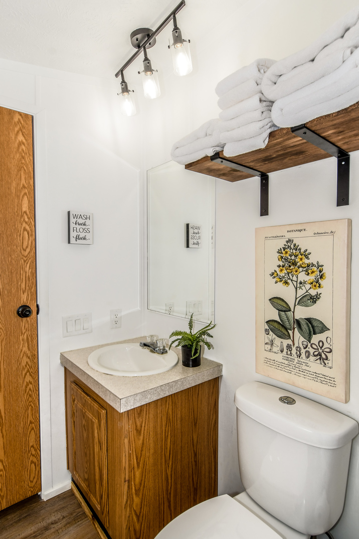 58 Oak Street Minooka, IL 60447 - Photo 11 of 28 a bathroom with a sink a toilet and shower